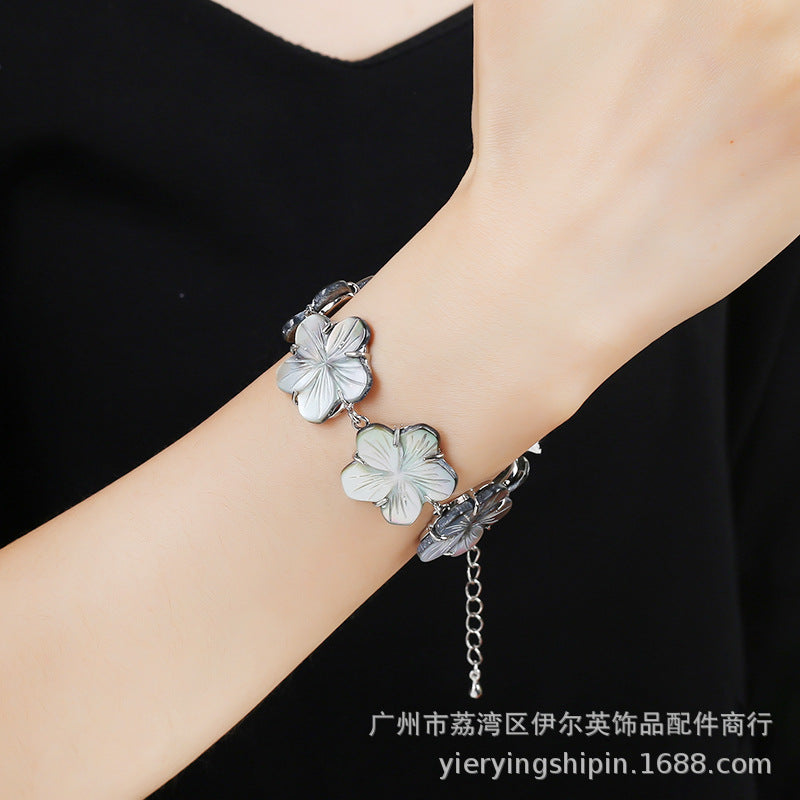 Natural black baby shell carved spiky bowl flower bracelet for women, lightweight and versatile wrist accessory
