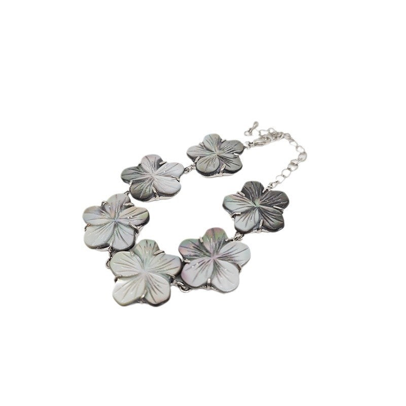 Natural black baby shell carved spiky bowl flower bracelet for women, lightweight and versatile wrist accessory