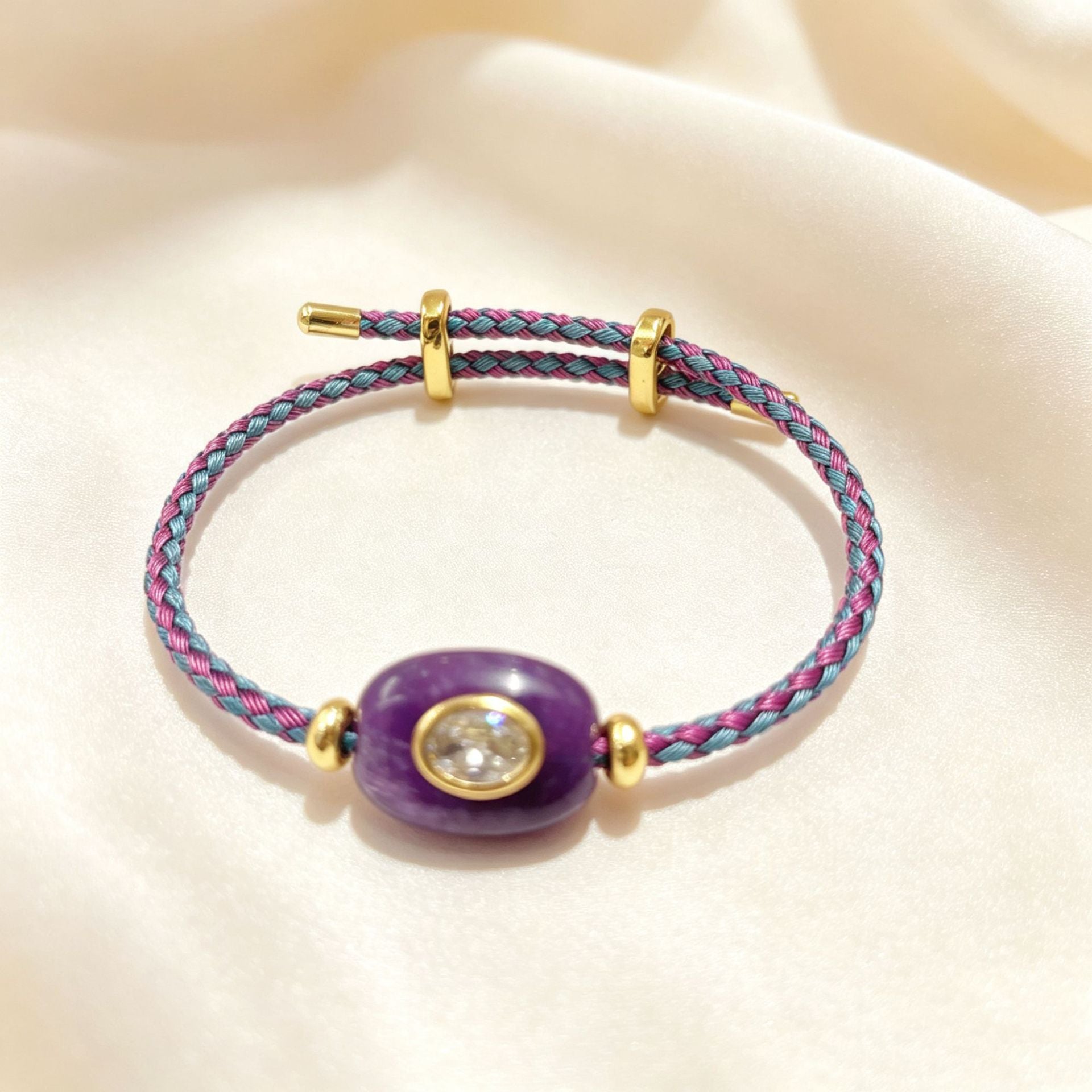 Hand-woven adjustable bracelet featuring crystals, gemstones, and gold threads—a colorful, mood-boosting accessory.
